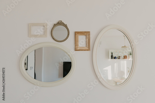 collection of frames  for pictures and mirrors