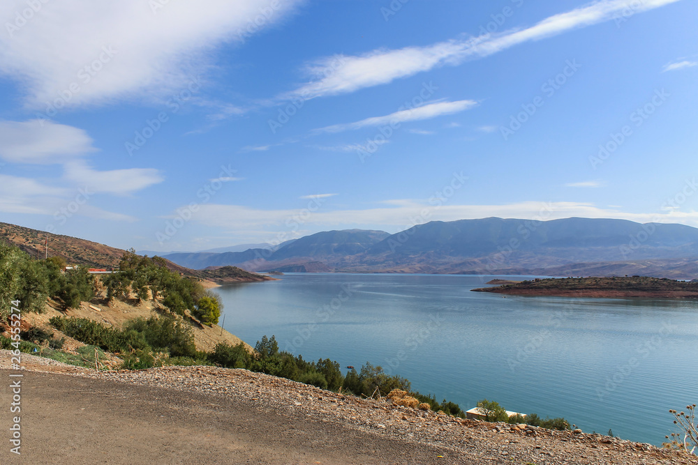 Bin El Ouidane, Azilal Province, Béni Mellal-Khénifra, Morocco - November 3, 2012: Panoramic view of the artificial lake of Bin el Oiudane located 1 km east of the village of the same name.