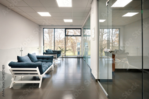 modern light office room with glass doors