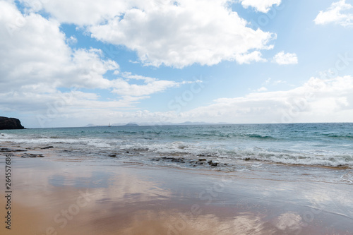 Panorama of beautiful beach and tropical sea of Lanzarote. Canaries