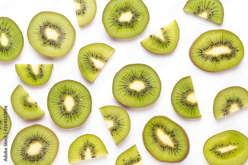 Fototapeta premium Kiwi fruit slices on white background.