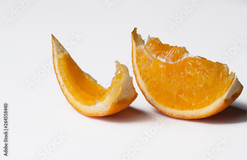 A piece of oranges isolated on a white background.