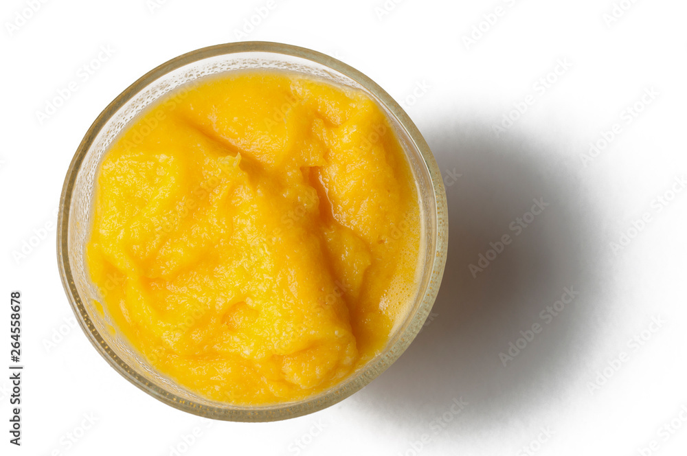 Grinded orange in bowl isolated on a white background.Fruit Grinded orange in bowl isolated on a white background.Fruit