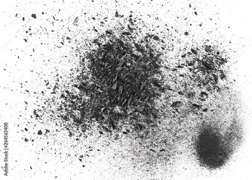 Black charcoal dust, gunpowder isolated on white background and texture, top view