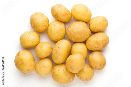 New potato and rosemarin isolated on white background close up.