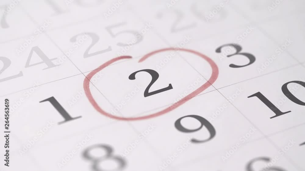 Marking the second 2 day of a month in the calendar with a red marker Marking the second 2 day of a month in the calendar with a red marker