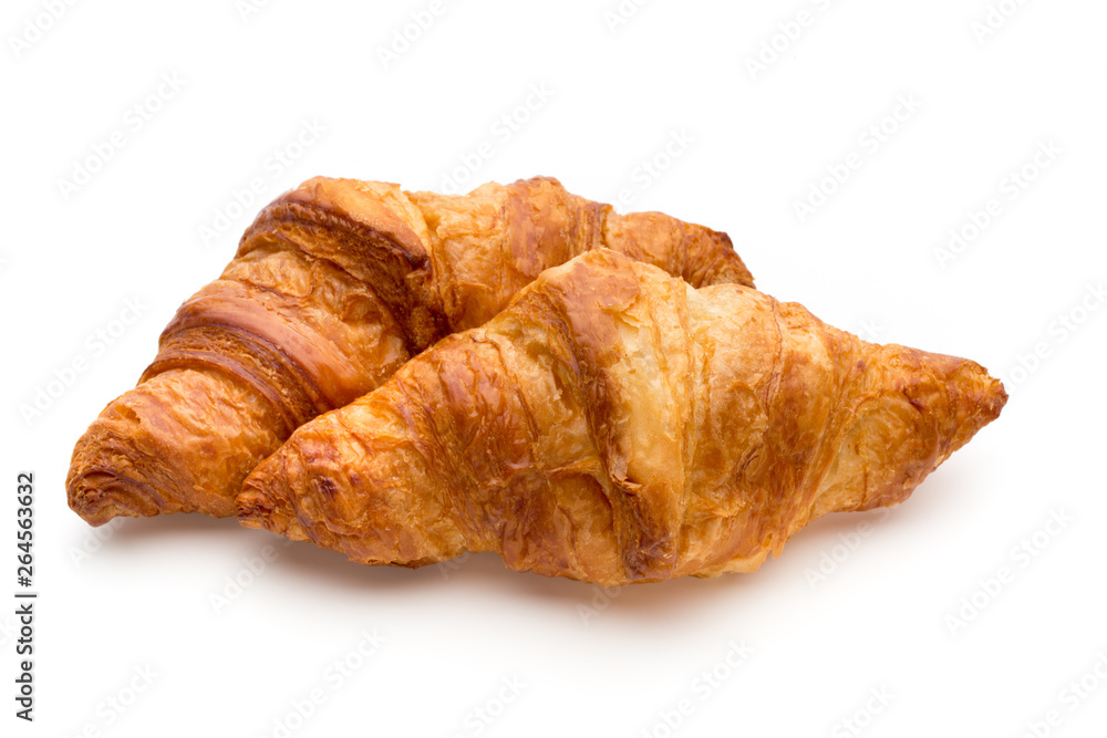 Tasty buttery croissants on the white background.