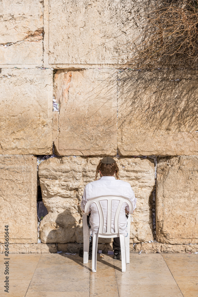 Man praying at the Western wall