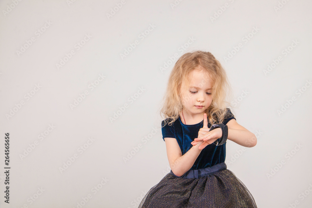 Little girl is using smartwatch phone. Little girl is using smartwatch phone.