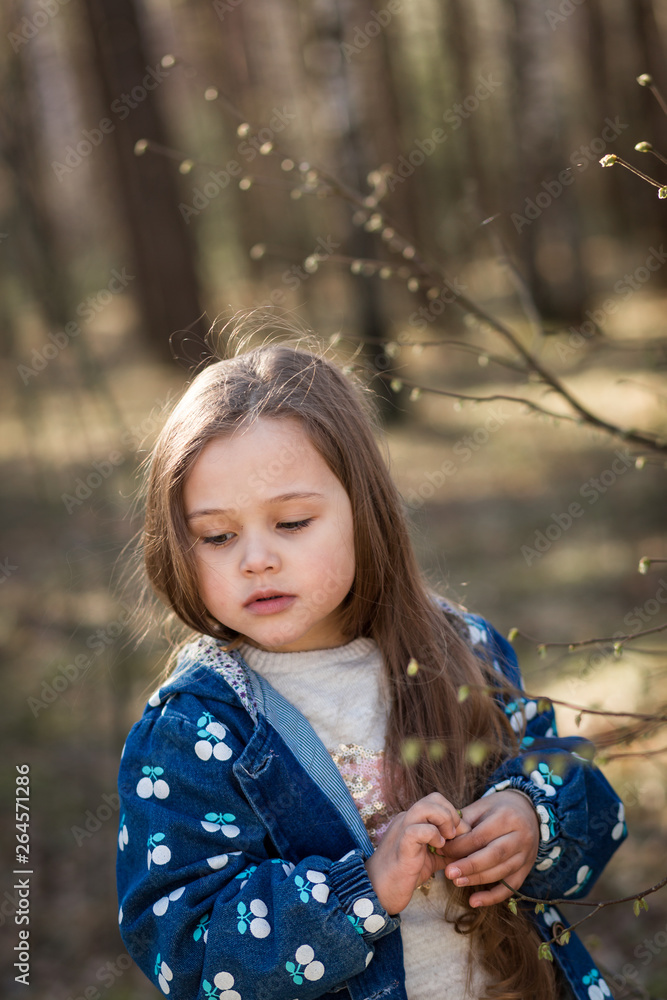 portrait of beautiful little girl with long hair in the woods on nature portrait of beautiful little girl with long hair in the woods on nature