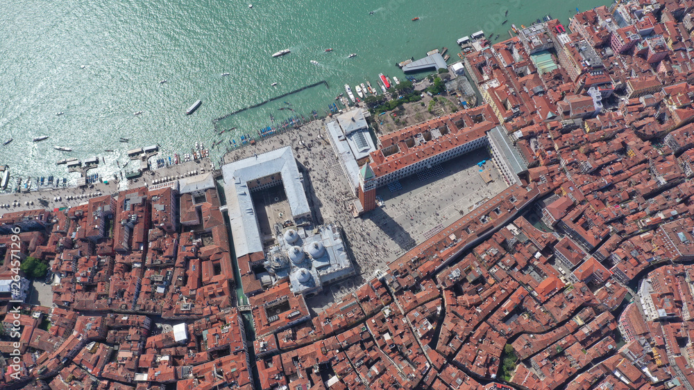 Aerial drone panoramic photo of iconic and unique Campanile in Saint Mark's square or Piazza San Marco, Venice, Italy