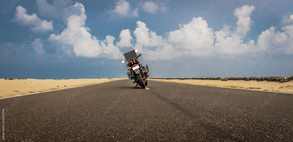 Motorcycle on road with sky and Ridding love message Motorcycle on road with sky and Ridding love message