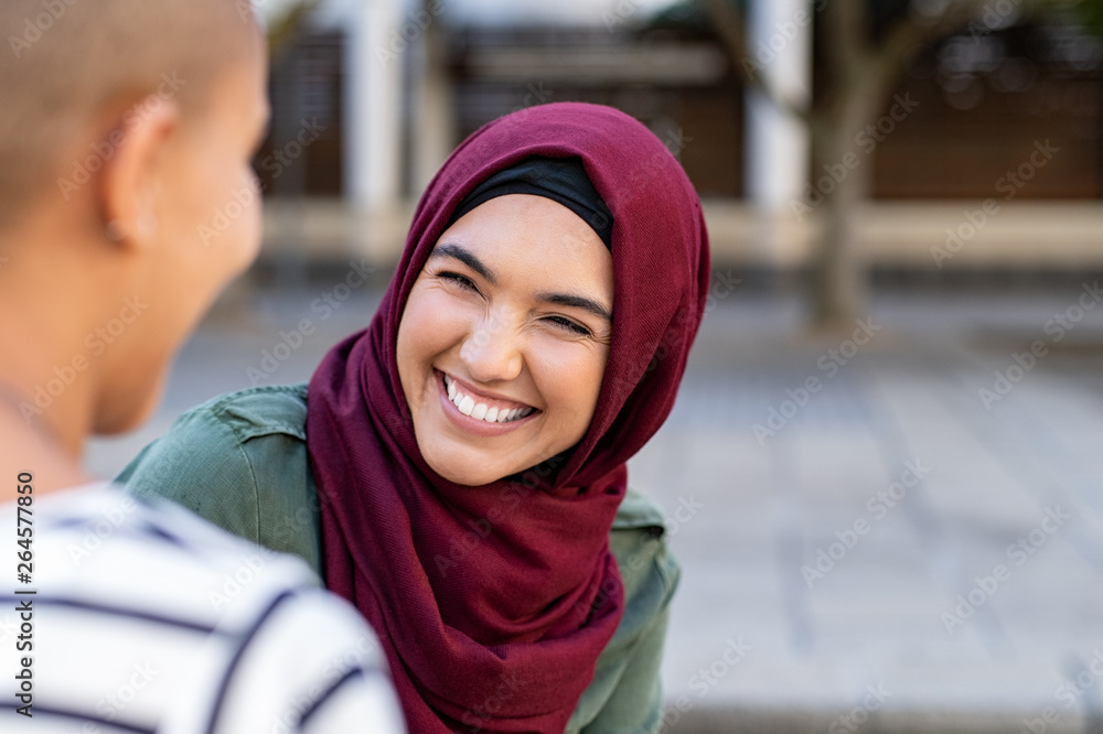 Multiethnic friends in conversation Multiethnic friends in conversation