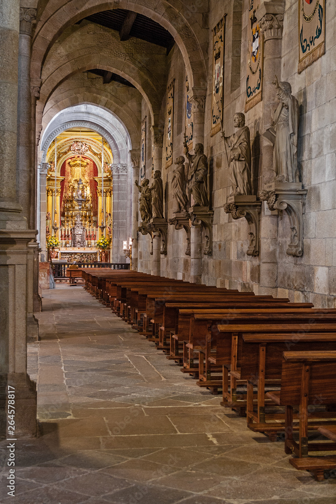Braga, Portugal - December 28, 2017: Se de Braga Cathedral interior. Aisle and chapel. Oldest Cathedral in Portugal. 11th century Romanesque with Gothic and Baroque adding
