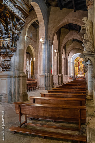 Braga, Portugal - December 28, 2017: Se de Braga Cathedral interior. Aisle and chapel. Oldest Cathedral in Portugal. 11th century Romanesque with Gothic and Baroque adding