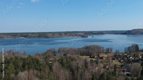 Flying to the lake forward or backward, slowly and fast sometimes with little dolly effect. Vallentuna, Sweden photo