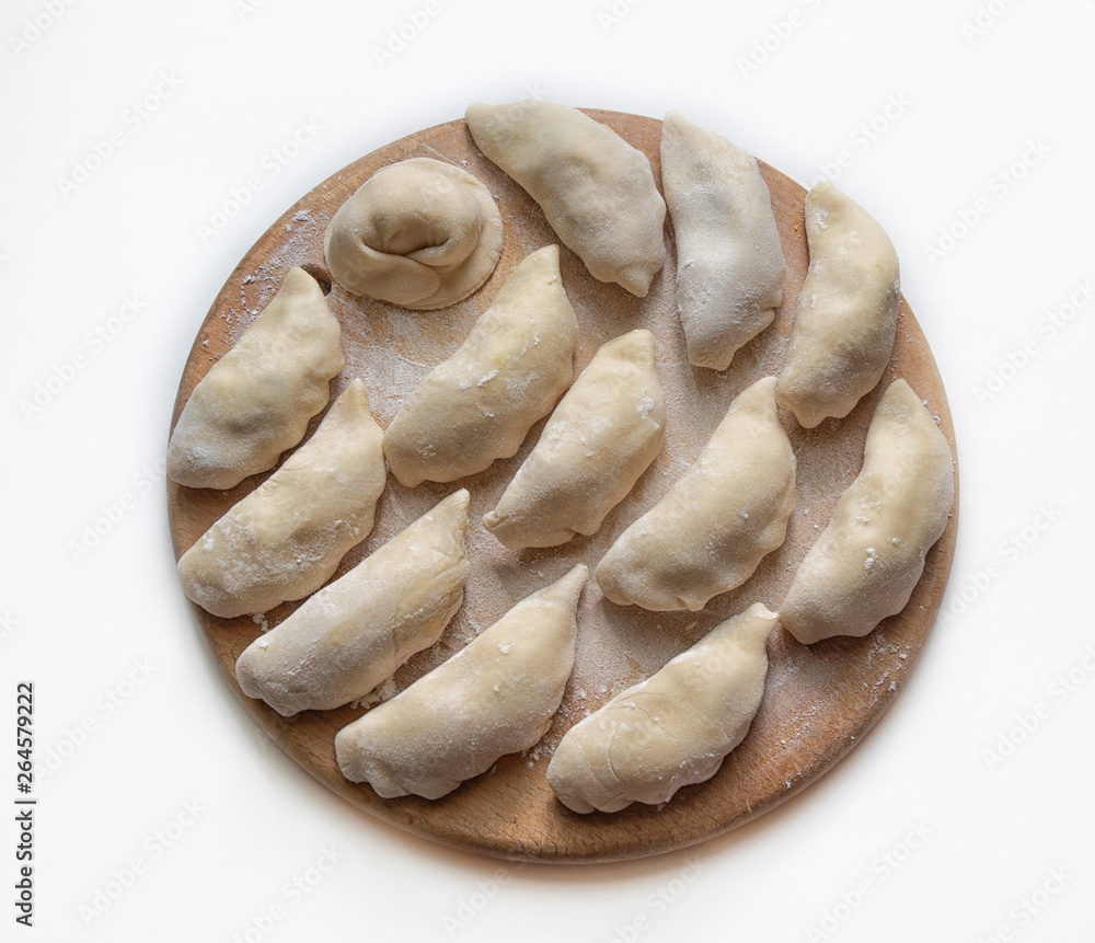 dumplings dumplings on a wooden circle. dumplings dumplings on a wooden circle.