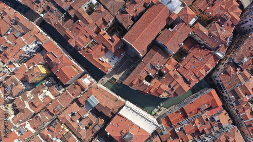 Aerial drone top view photo of small Canal near Rialto bridge, Venice, Italy