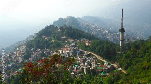 Gangtok city is on mountain range from high view morning time, Zoom out.