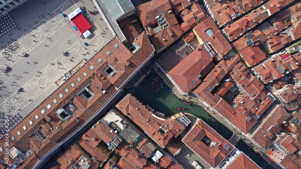 Aerial drone photo of famous Gondola station next to Saint Mark's square in Venice, Italy