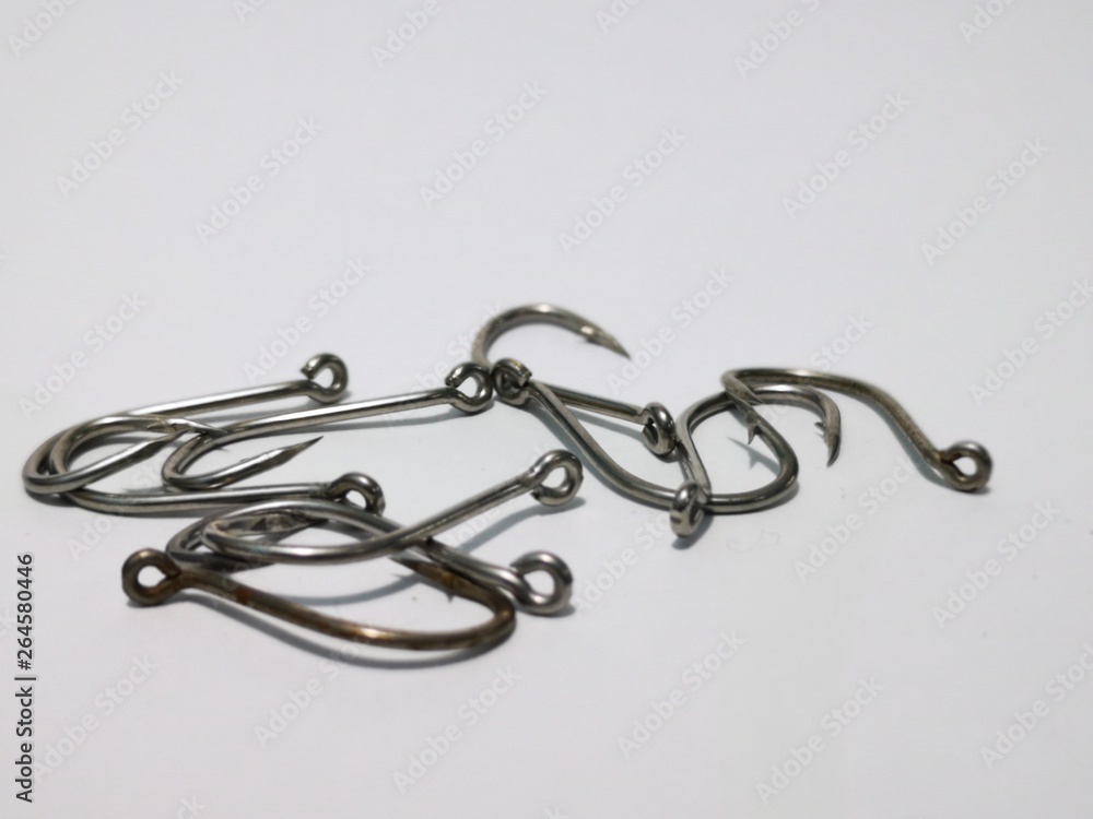Closeup and macro shot of fishing accessories, fishing hock and fishing s,crimps,equipment,fish,fisherman,fishing,fishing hook,fishing swivel,hard,hole,hook,icon,isolated,jig,leisure,line,loop,metal,m Closeup and macro shot of fishing accessories, fishing hock and fishing s,crimps,equipment,fish,fisherman,fishing,fishing hook,fishing swivel,hard,hole,hook,icon,isolated,jig,leisure,line,loop,metal,m