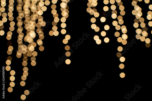 light night city bokeh abstract background glittering stars on bokeh. Orange bokeh in the bottom of the picture. Has a black background- Image