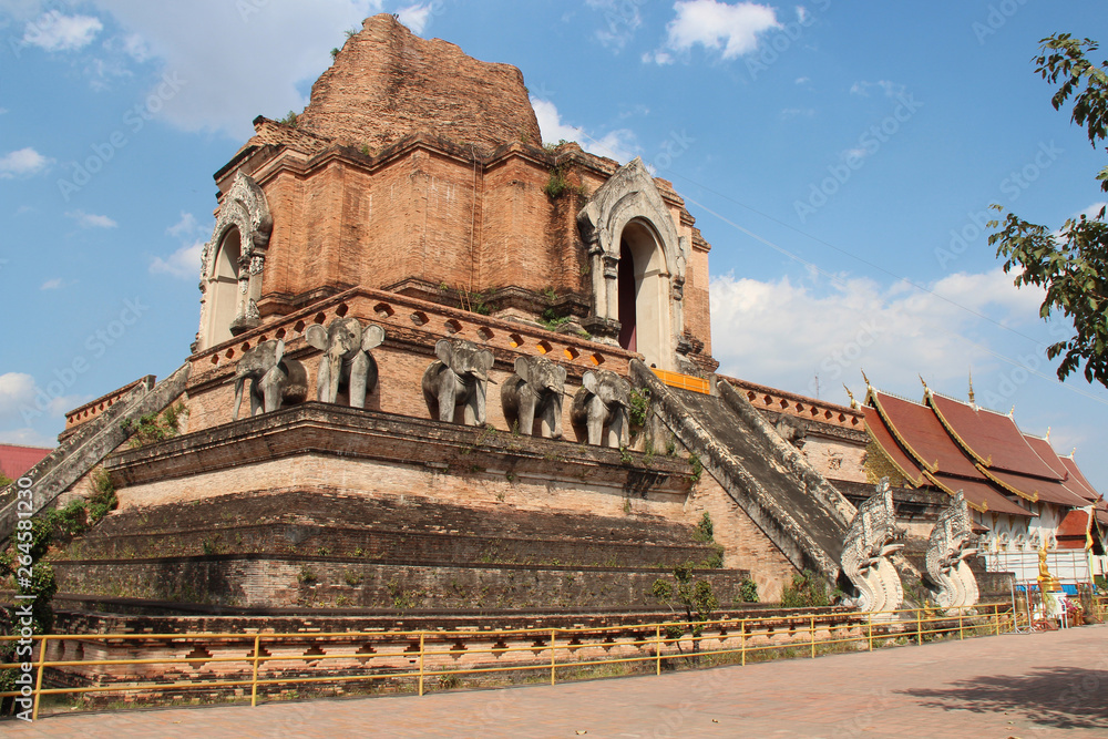 stupa in a buddhist temple (wat chedi luang) in chiang mai (thailand)