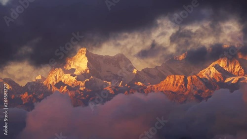 Time-lapse close-up cloud moving in front of Kangchenjunga mount at twilight time , Lockdown. photo