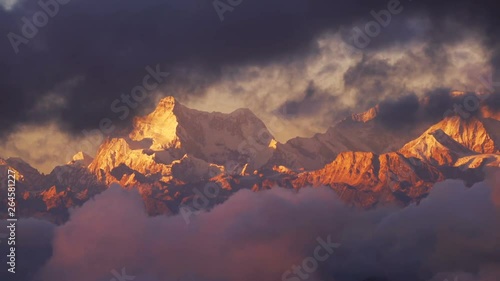 Time-lapse close-up cloud moving in front of Kangchenjunga mount at twilight time , Lockdown.