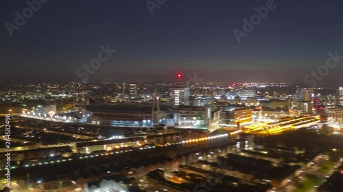 Wallpaper Mural Aerial drone night hyperlapse facing east tracking over Cardiff city Principality Millennium Stadium toward Cardiff Castle and Bute park. Produced from DNG raw stills on DJI Mavic 2 Pro Torontodigital.ca