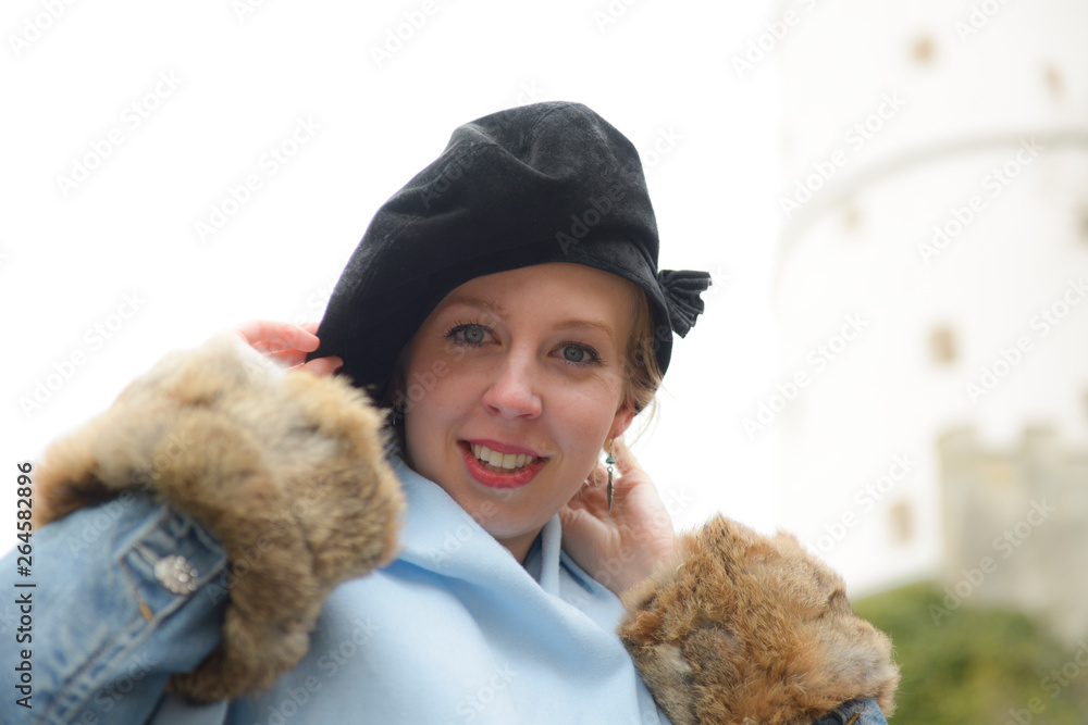 portrait of a girl with a hat and warm clothing