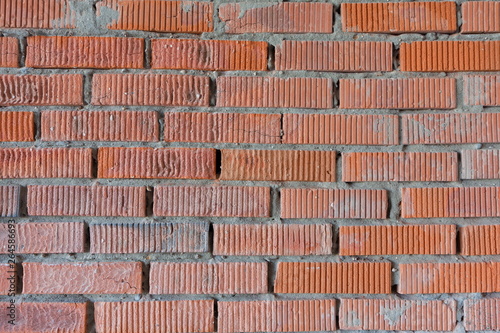 The texture of the walls of the construction of porous brick