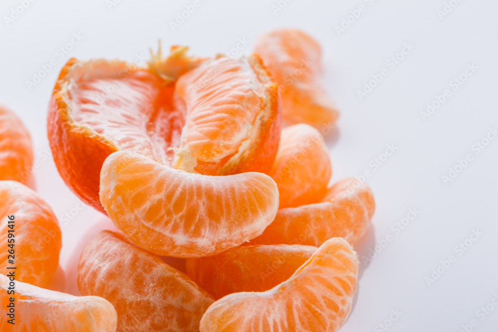juicy mandarin on a white acrylic background juicy mandarin on a white acrylic background