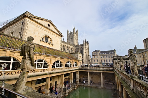 Bath, Somerset, England - December 24, 2018: The Roman Baths complex is a site of historical interest in the English city of Bath. It is a well-preserved Roman site once used for public bathing.