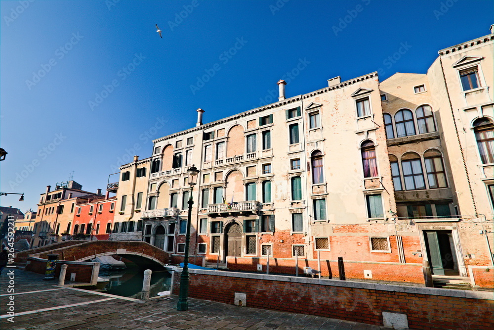 Venice, Italy - December 29, 2018: Typical view in the old town with water channels and bridges