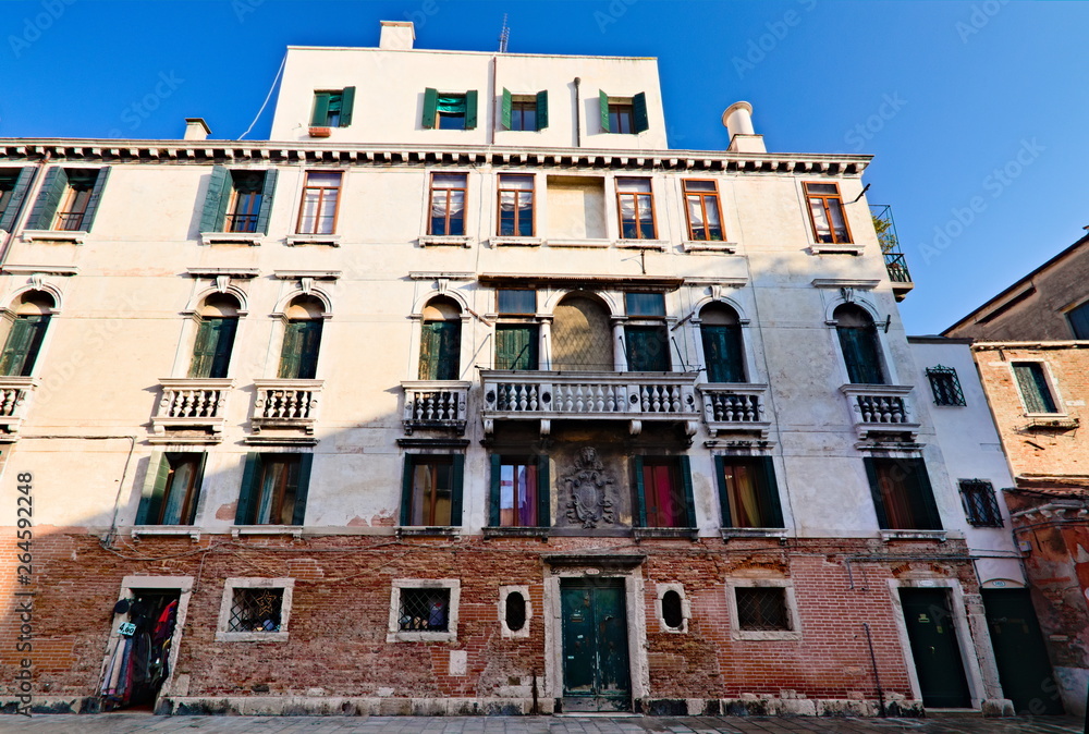 Naklejka premium Typical old building in the old city of Venice, afternoon winter view