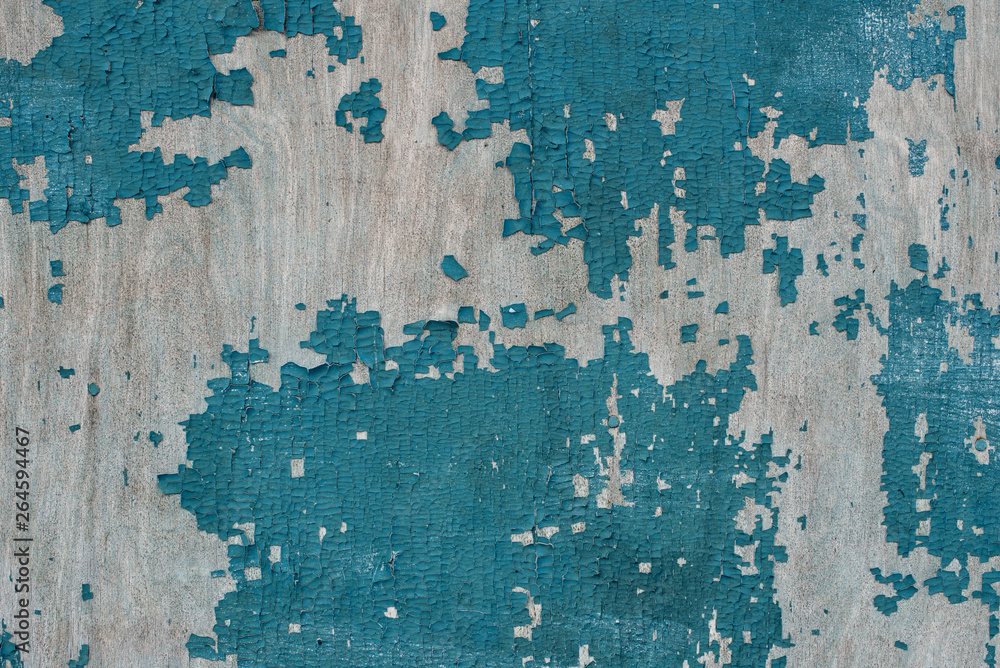 cracked old paint on wooden planks. Blue