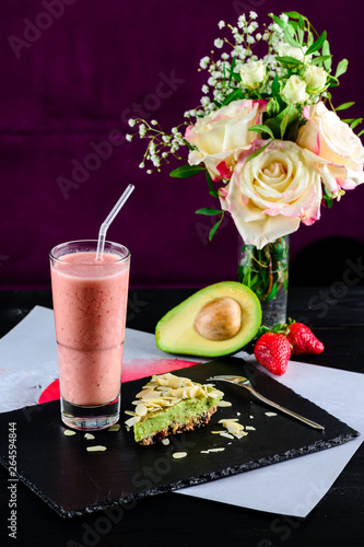 strawberry smoothie and avocado tart. Healthy foods or dessert concept.