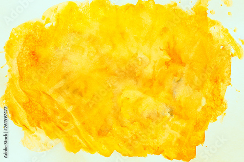 Paint stains are yellow and mustard color. Amber and stone texture.
