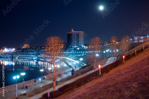 Tyumen  Russia  on April 19  2019  The moon over the embankment in Tyumen in the evening.