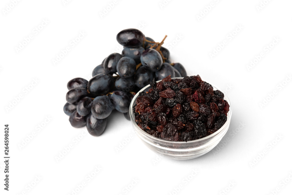 Raisin and grapes isolated on white background. Raisin and grapes isolated on white background.