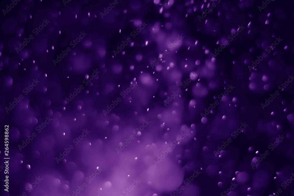 Obraz premium Bokeh purple proton background abstract