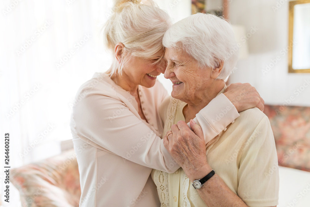 Senior woman spending quality time with her daughter Senior woman spending quality time with her daughter