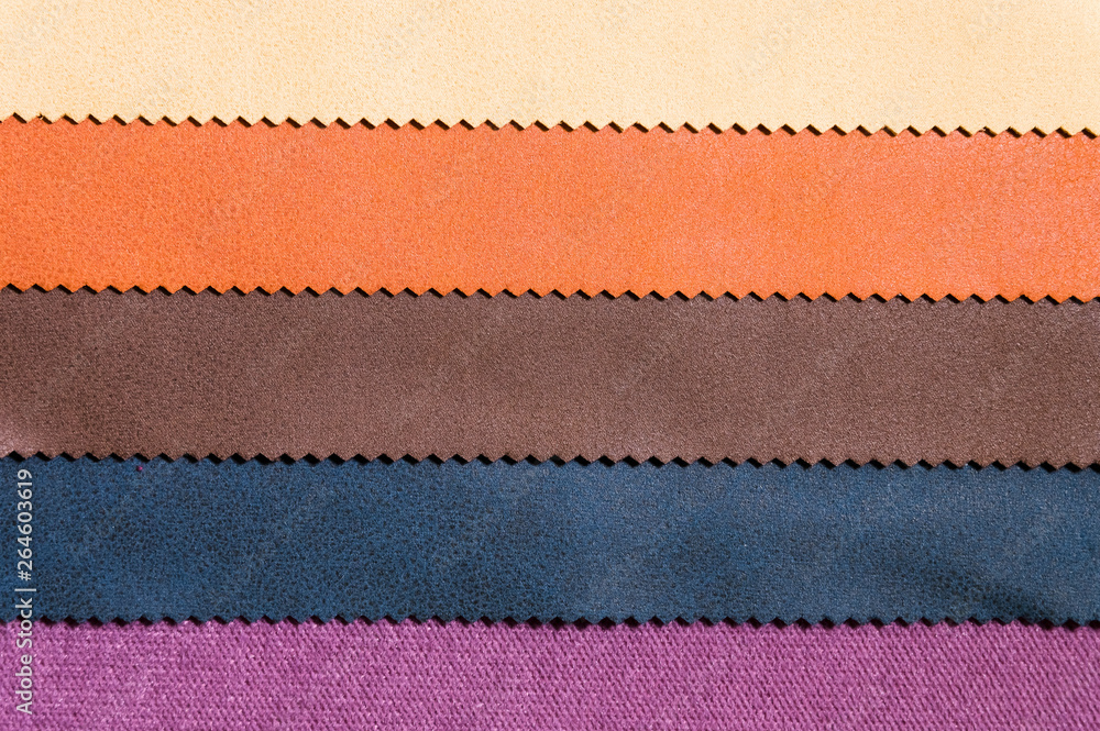 A set of samples of fabric furniture decoration lines of textile textures. Multicolored stripes upholstery. Mode and tone for a luxurious interior style. Abstract background A set of samples of fabric furniture decoration lines of textile textures. Multicolored stripes upholstery. Mode and tone for a luxurious interior style. Abstract background