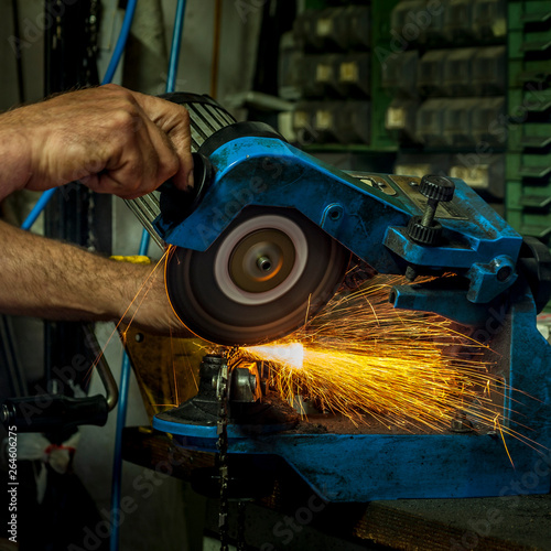 Worker doing his work using a circular saw