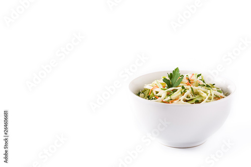 Coleslaw salad in white bowl isolated on white background. Copyspace