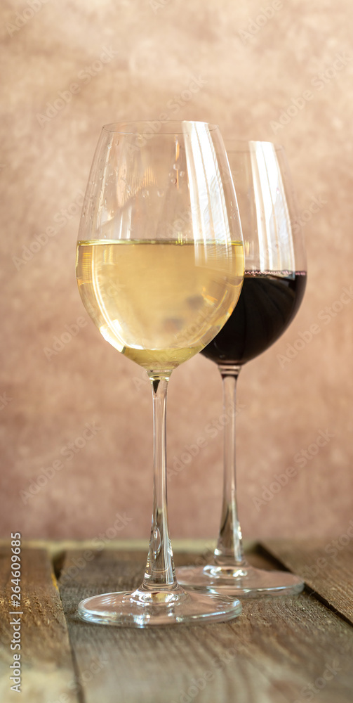 Glasses of white and red wine Glasses of white and red wine