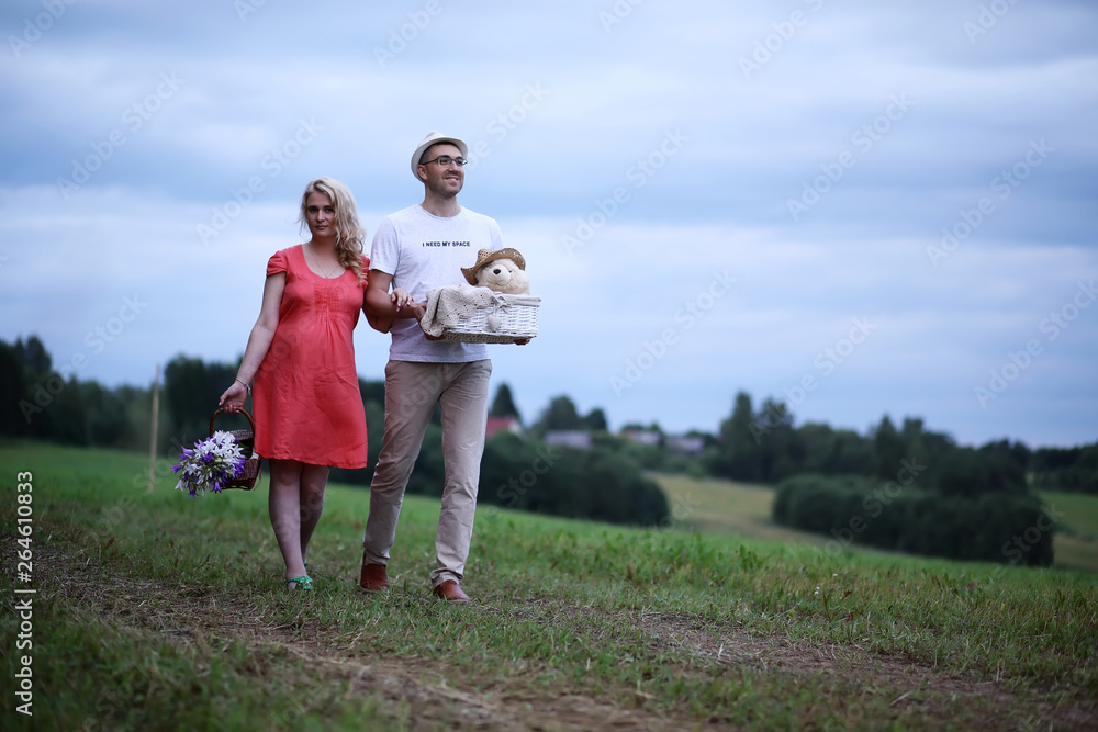 Pregnant girl with big belly and young man outdoor Pregnant girl with big belly and young man outdoor
