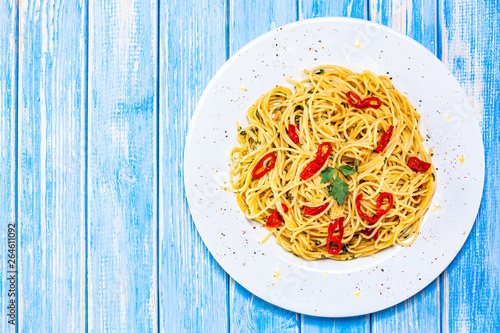 Spaghetti aglio e olio - pasta with chili and garlic photo