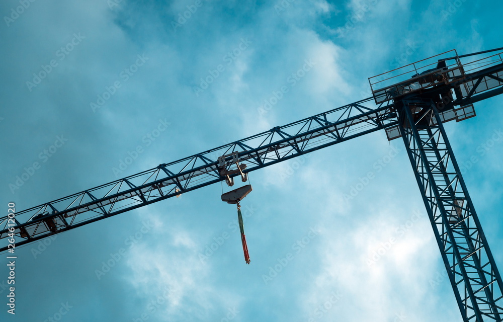 Industrial crane details on the sky